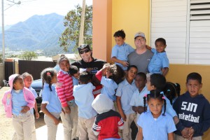 Video experts Donnie and Adam with some children at Cecaini School
